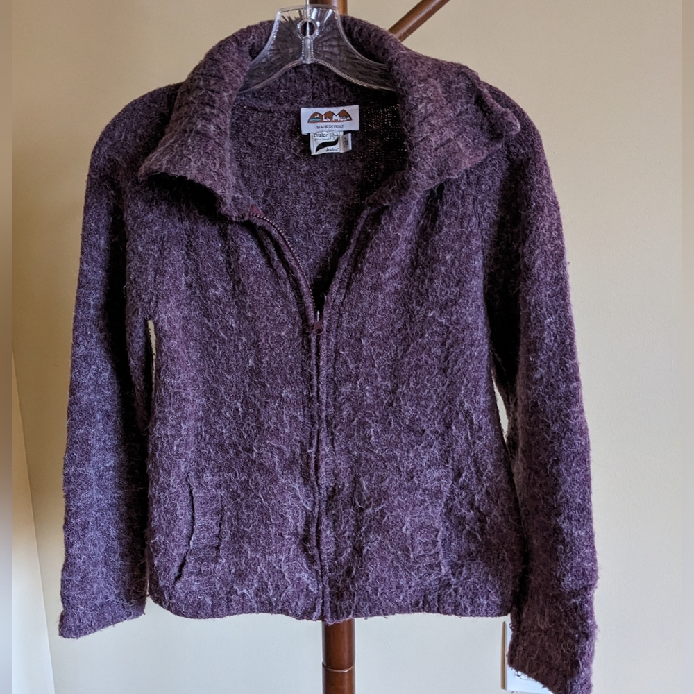 Zip up sweater, made in Peru.